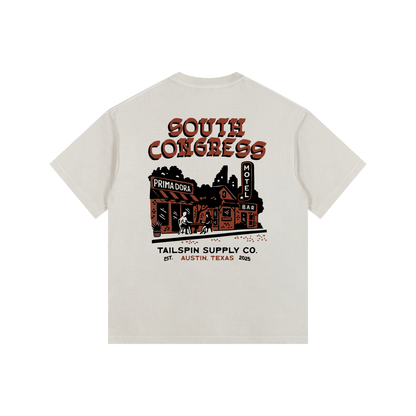 Beige t-shirt with 'South Congress' graphic design on a white background