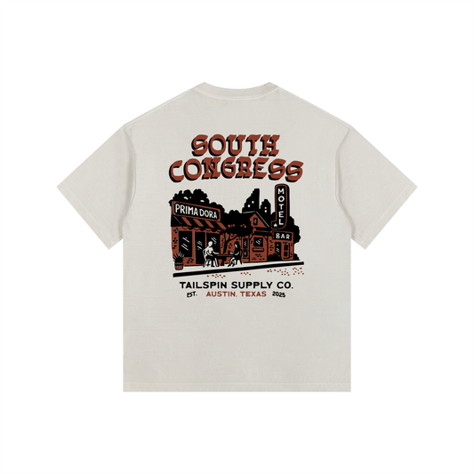 Beige t-shirt with 'South Congress' graphic design on a white background